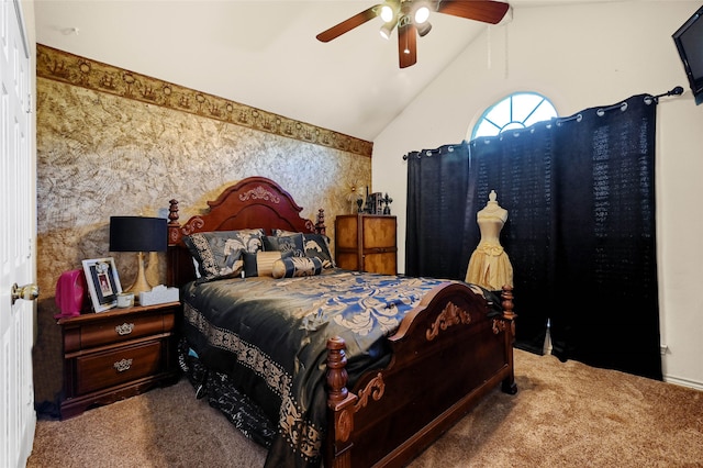 bedroom with ceiling fan, lofted ceiling, and carpet flooring