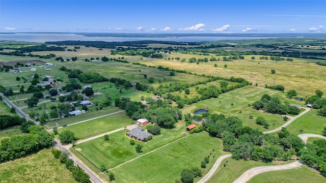 bird's eye view with a water view and a rural view