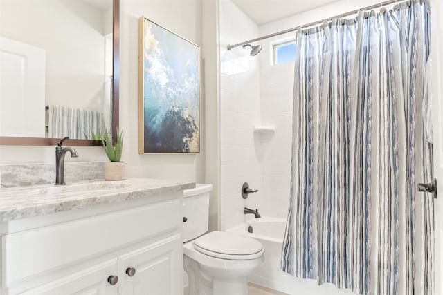 full bathroom with toilet, shower / bath combo with shower curtain, and vanity