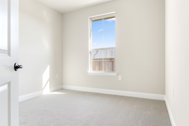 empty room with carpet flooring