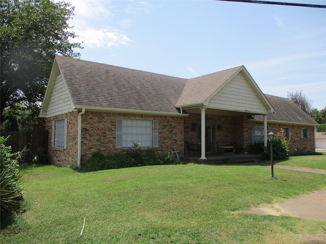 ranch-style house with a front yard