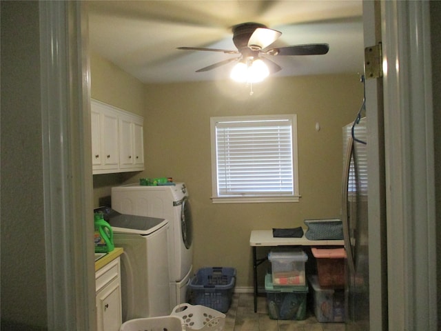 clothes washing area featuring cabinets, independent washer and dryer, and ceiling fan