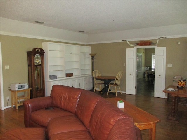 living room featuring dark hardwood / wood-style flooring