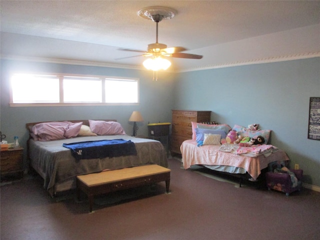 bedroom with ceiling fan, carpet flooring, and crown molding