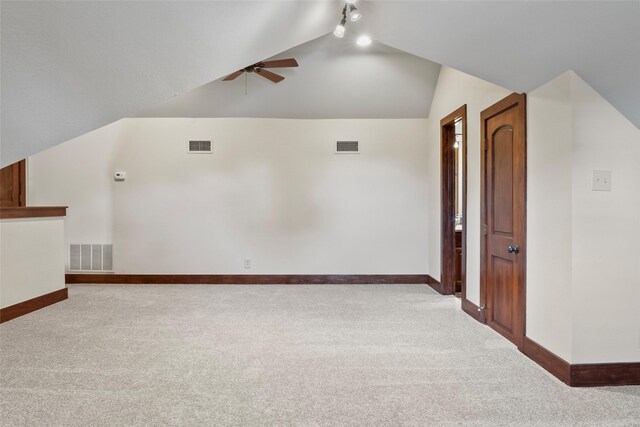 bonus room with carpet, ceiling fan, and lofted ceiling