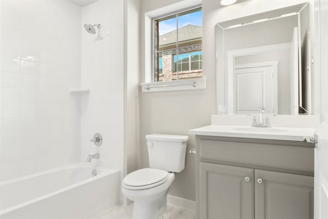 full bath featuring toilet, baseboards, shower / bathing tub combination, and vanity