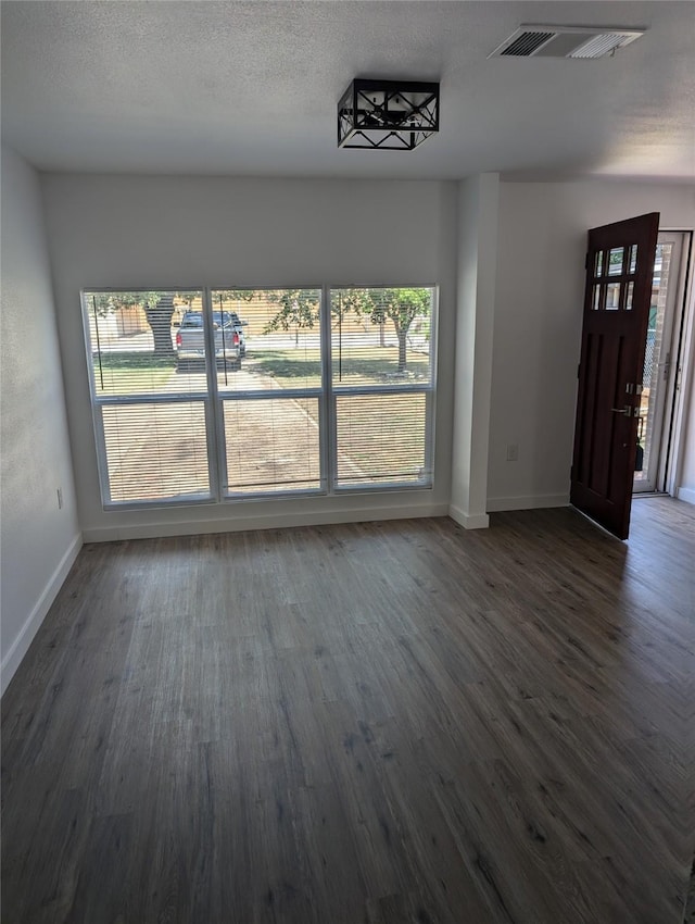 interior space with dark hardwood / wood-style flooring