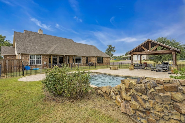 view of swimming pool with a gazebo, a yard, and a patio