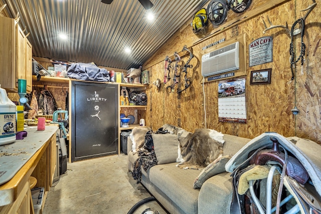 miscellaneous room with a wall mounted air conditioner, vaulted ceiling, a workshop area, and ceiling fan