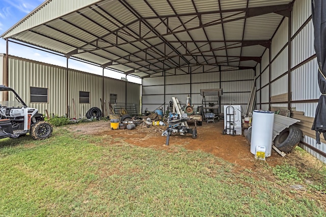 garage featuring a yard