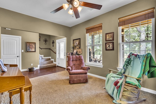 sitting room with ceiling fan