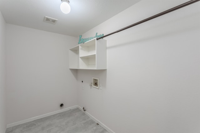 clothes washing area featuring electric dryer hookup, washer hookup, and hookup for a gas dryer