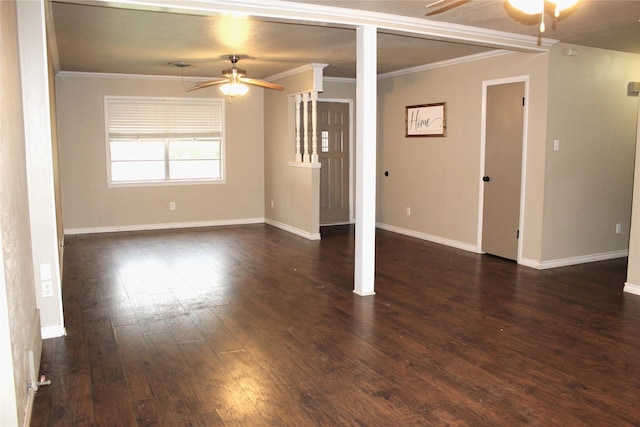 unfurnished room featuring ceiling fan, dark wood-type flooring, and ornamental molding