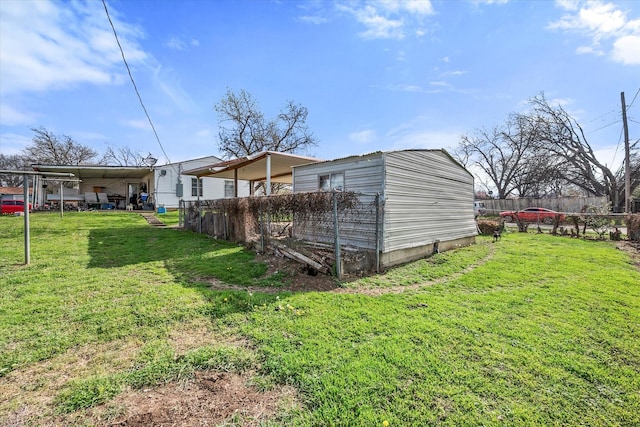 view of yard with a carport