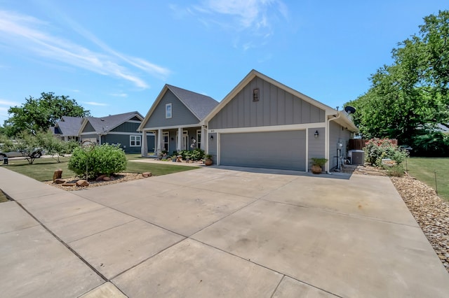 view of front of property with a garage and a front yard