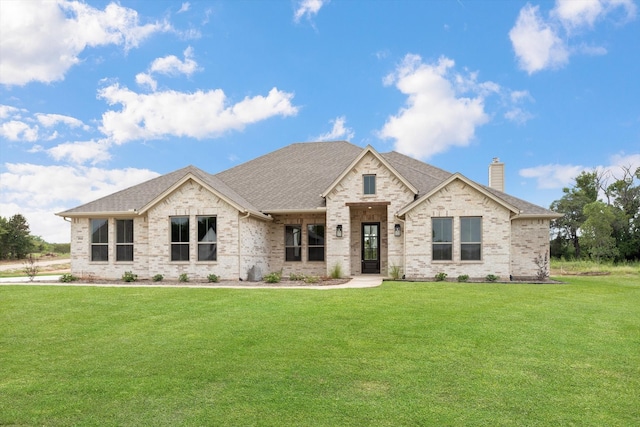 view of front facade with a front lawn