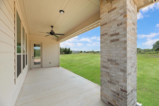 view of patio / terrace featuring ceiling fan