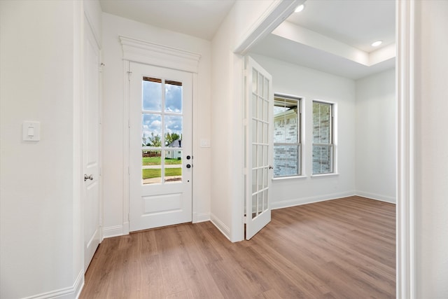 entryway with light hardwood / wood-style floors