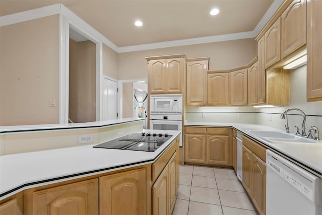 kitchen with sink, white appliances, light tile patterned floors, ornamental molding, and light brown cabinetry