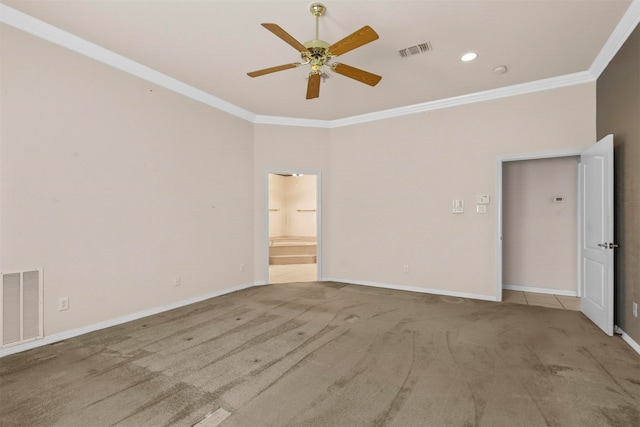 unfurnished room featuring ornamental molding, ceiling fan, and light colored carpet