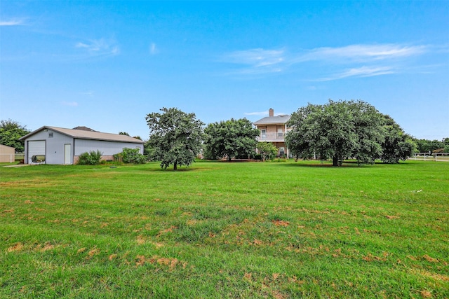 view of yard featuring a garage