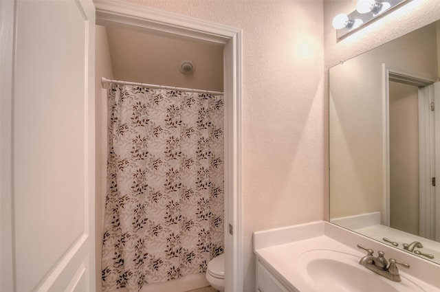 9816 Mullins Crossing Dr, Fort Worth, TX 76126 - bathroom with vanity, toilet, and a shower with shower curtain