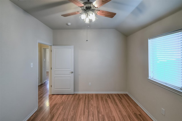 9816 Mullins Crossing Dr, Fort Worth, TX 76126 - unfurnished room featuring wood finished floors, baseboards, a ceiling fan, a smoke detector, and lofted ceiling