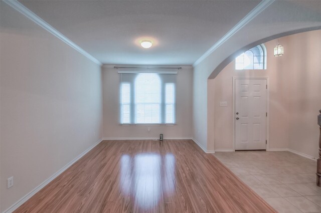 tiled entryway with crown molding