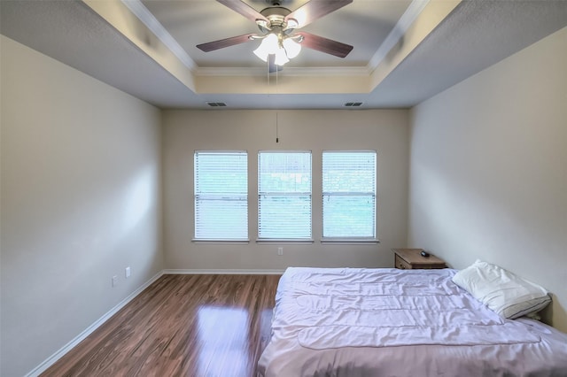 9816 Mullins Crossing Dr, Fort Worth, TX 76126 - bedroom with a tray ceiling, ornamental molding, wood finished floors, baseboards, and ceiling fan
