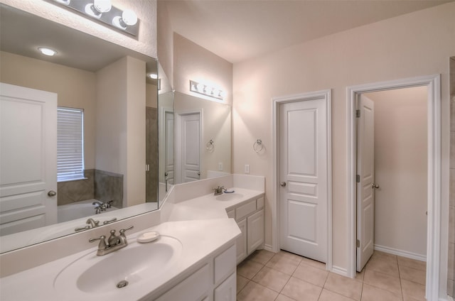 9816 Mullins Crossing Dr, Fort Worth, TX 76126 - full bathroom featuring vanity, tile patterned flooring, and a garden tub