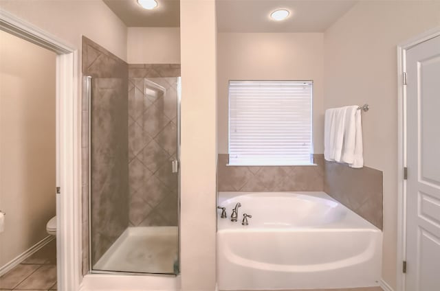 9816 Mullins Crossing Dr, Fort Worth, TX 76126 - full bathroom featuring a bath, a stall shower, toilet, and tile patterned floors
