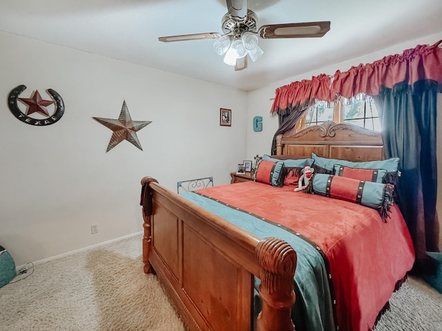 bedroom featuring ceiling fan and light carpet