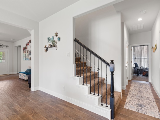 interior space with dark hardwood / wood-style floors