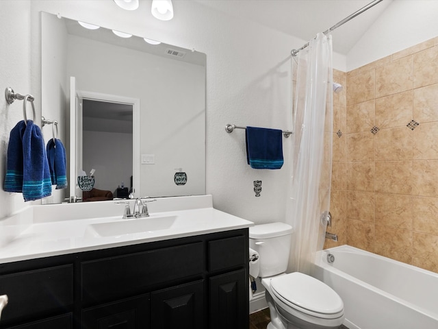 full bathroom featuring vanity, vaulted ceiling, shower / bath combo, and toilet