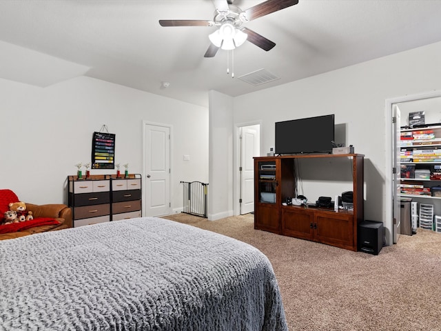 carpeted bedroom featuring ceiling fan