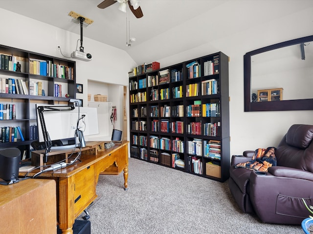 office space featuring ceiling fan, carpet flooring, and lofted ceiling