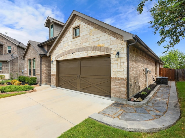 view of front of home featuring cooling unit