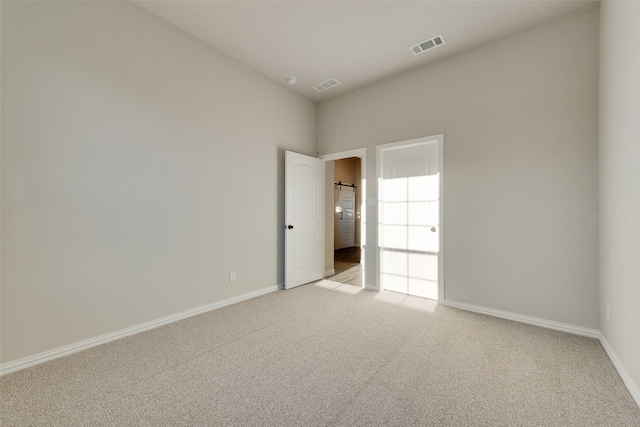 view of carpeted spare room