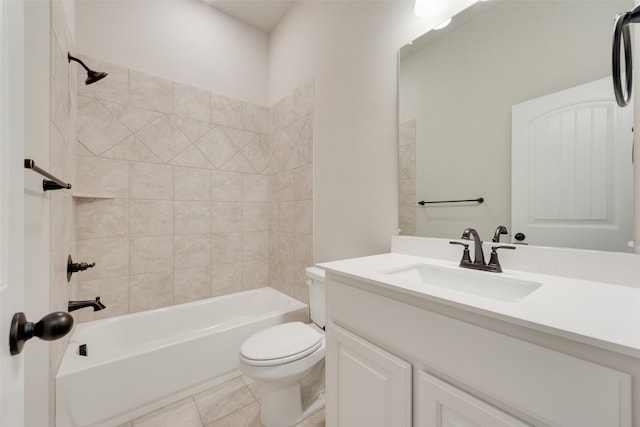 full bathroom with vanity, tile patterned flooring, tiled shower / bath combo, and toilet