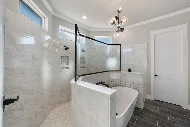 bathroom featuring plus walk in shower, crown molding, tile patterned flooring, and an inviting chandelier