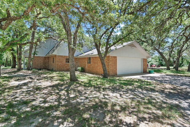 view of property exterior with a garage