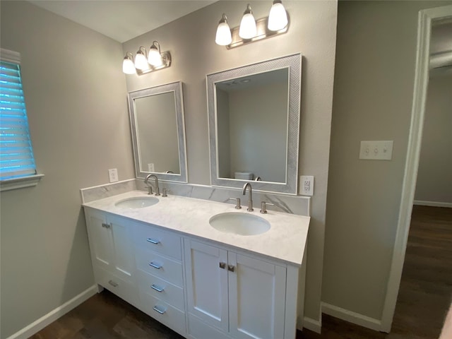 bathroom featuring vanity, toilet, and wood-type flooring