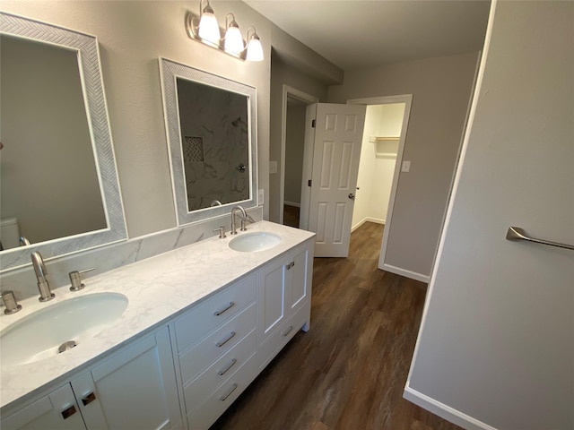 bathroom featuring hardwood / wood-style floors and vanity