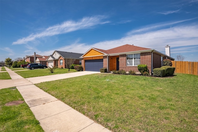 ranch-style house with a garage and a front yard