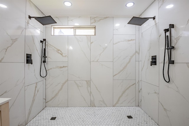 bathroom with a tile shower