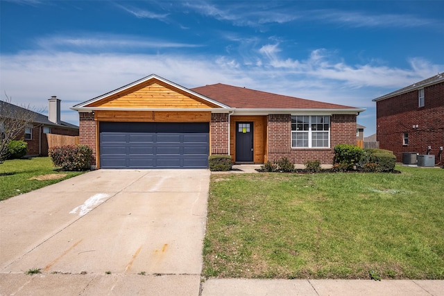 ranch-style home featuring a front yard, a garage, and cooling unit