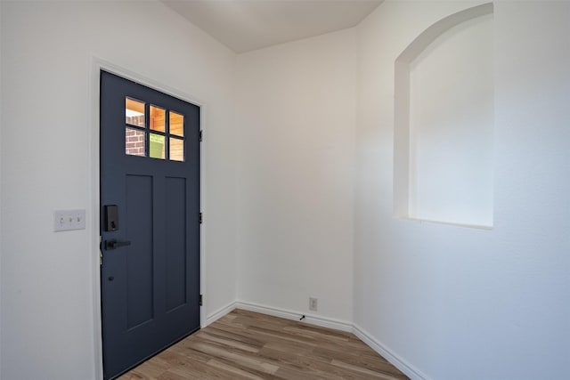 foyer with light wood-type flooring