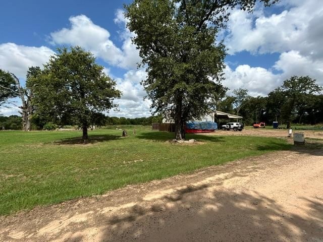 view of home's community featuring a lawn