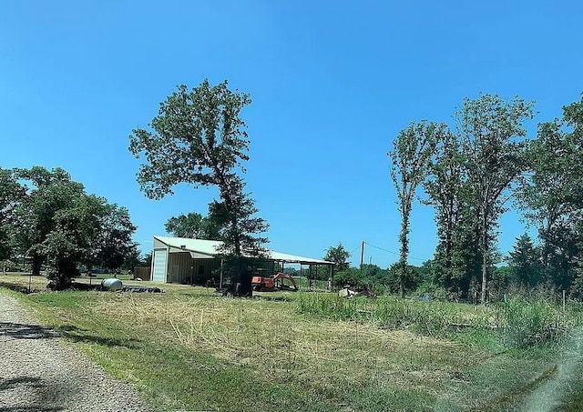 view of yard with a carport