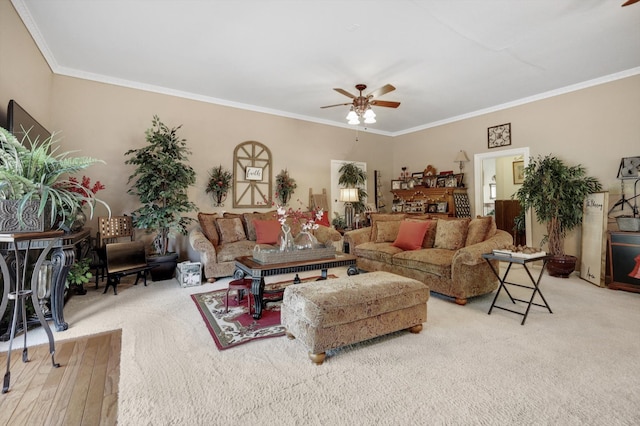 living room featuring carpet flooring, crown molding, and ceiling fan